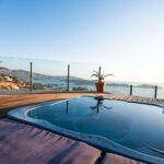Outdoor whirlpool of Junior Suite with immaculate sea view